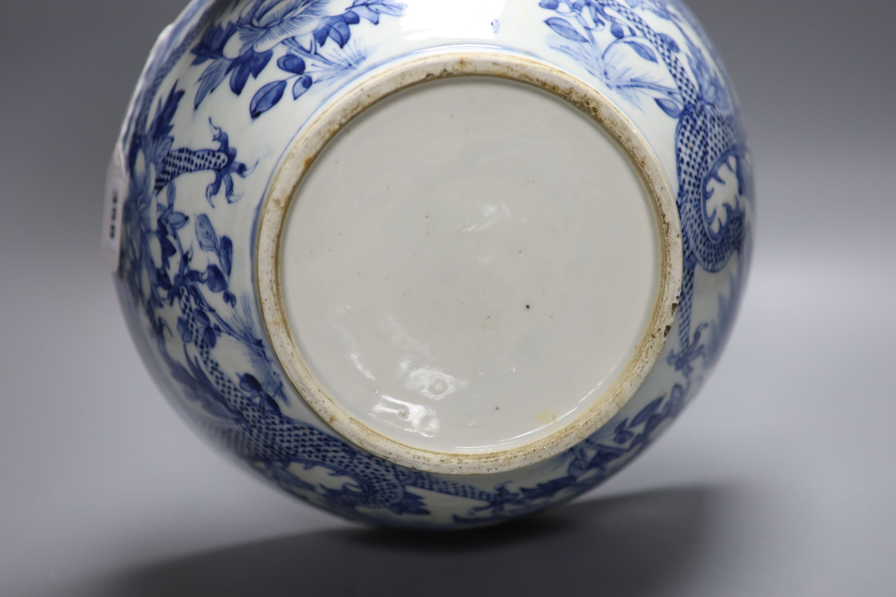 A 19th century Chinese porcelain blue and white dragon bowl, diameter 30cm